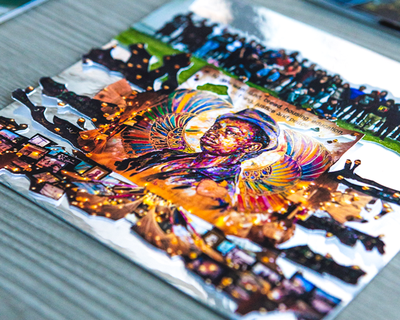 Close-up of colorful artwork on a textured gray table